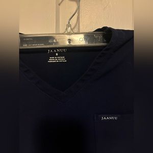 Jaanuu scrub top. Navy Size small. Excellent condition